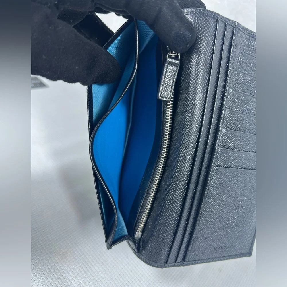 1050: Bvlgari Logo Ring Continental Wallet Black Grained Leather Blue